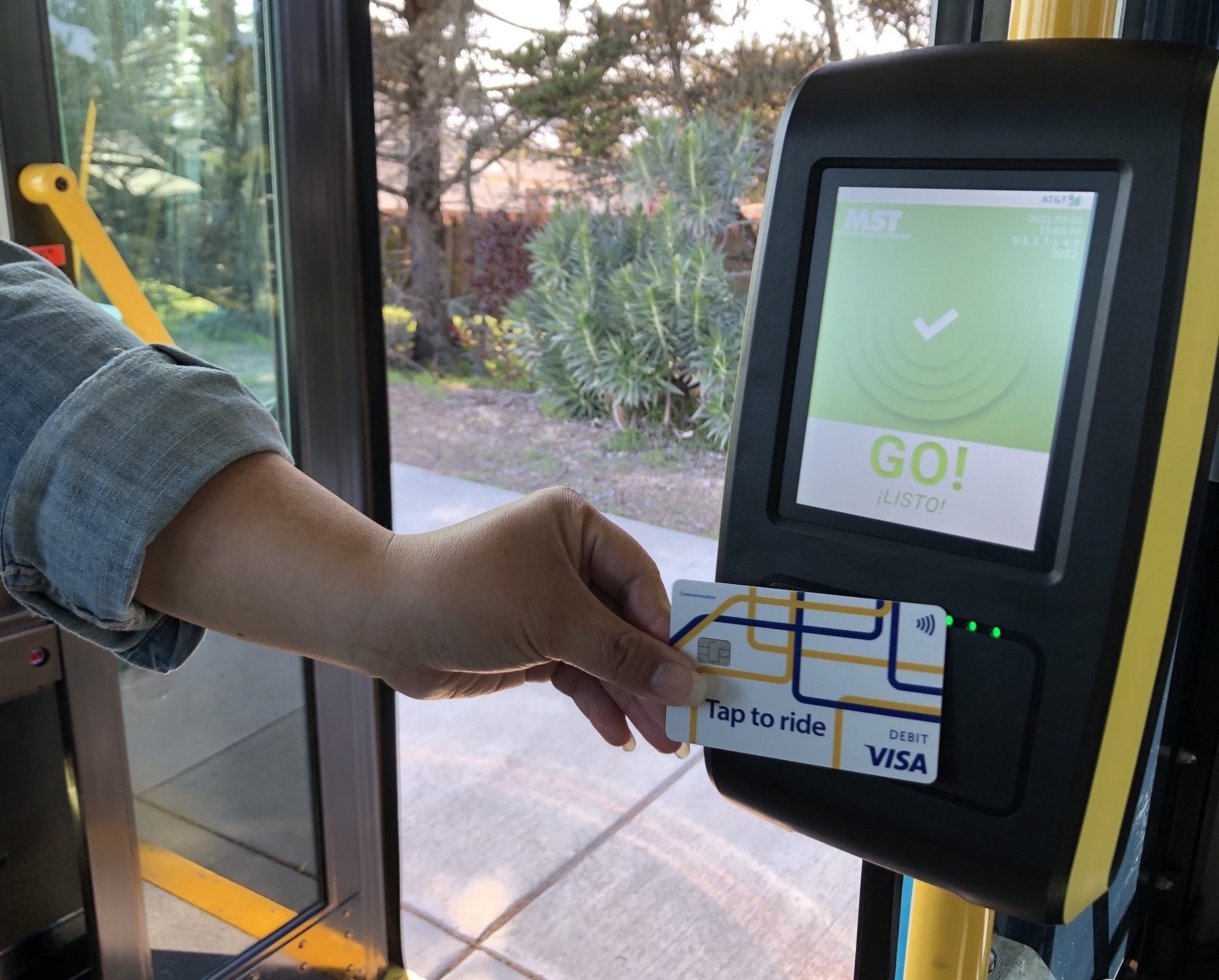 Visa card being tapped on MST terminal.