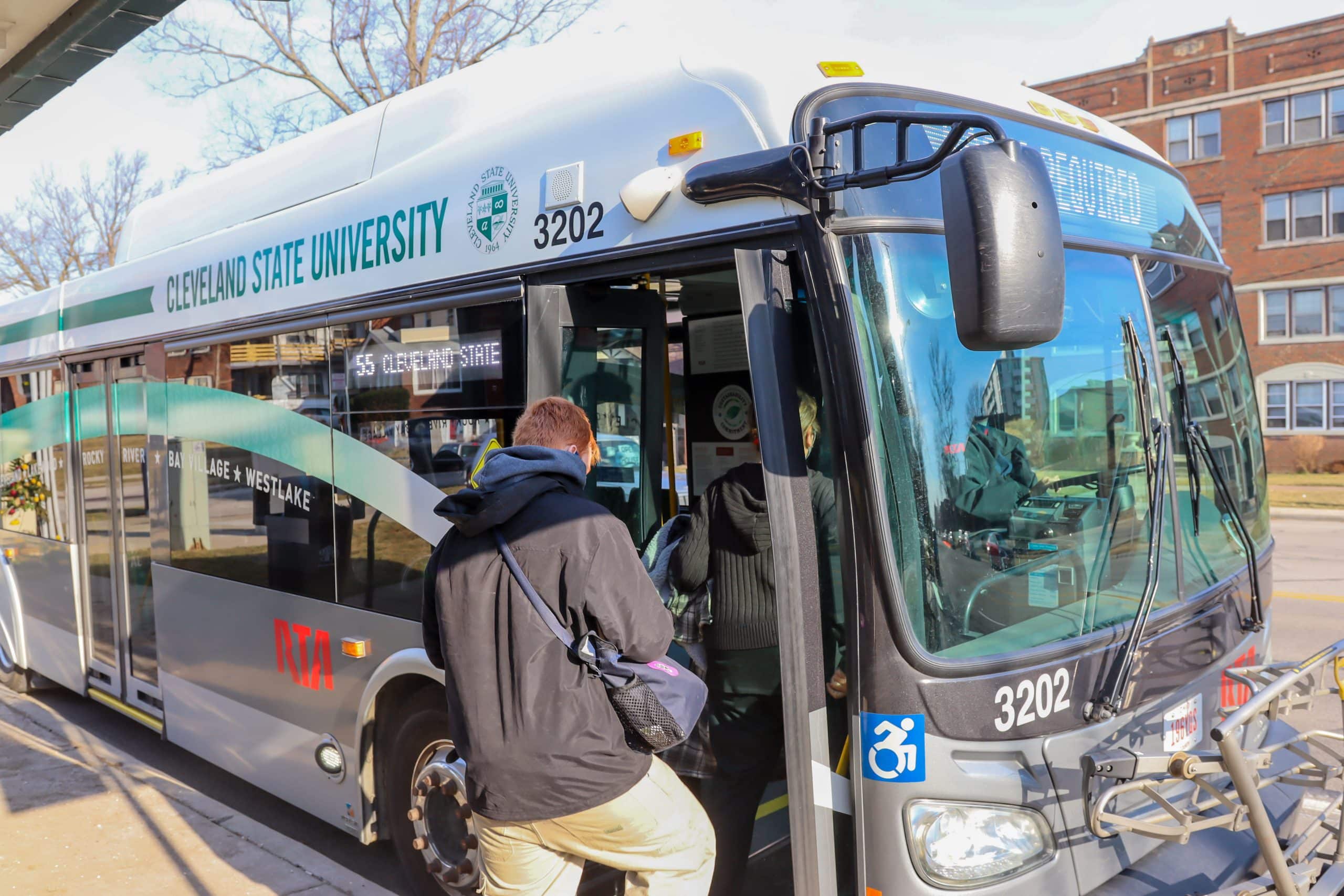 Cleveland, rider getting on board bus